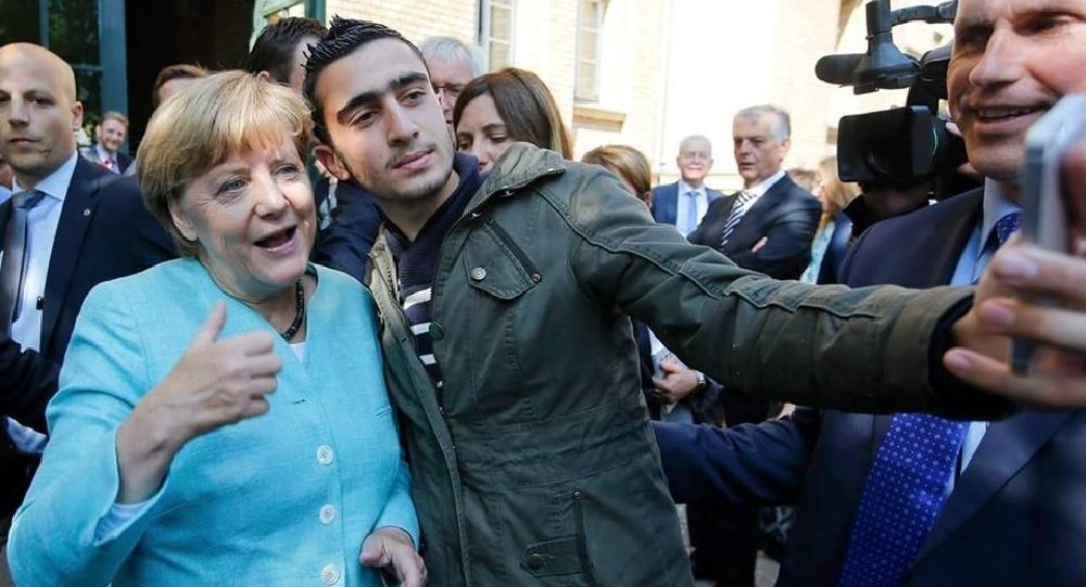 merkel-migrant-selfie