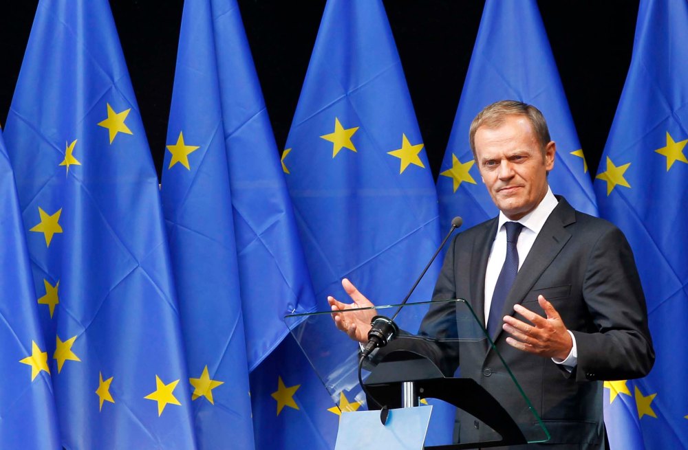 Poland's PM Tusk delivers a speech during a ceremony at the EU Parliament in Brussels